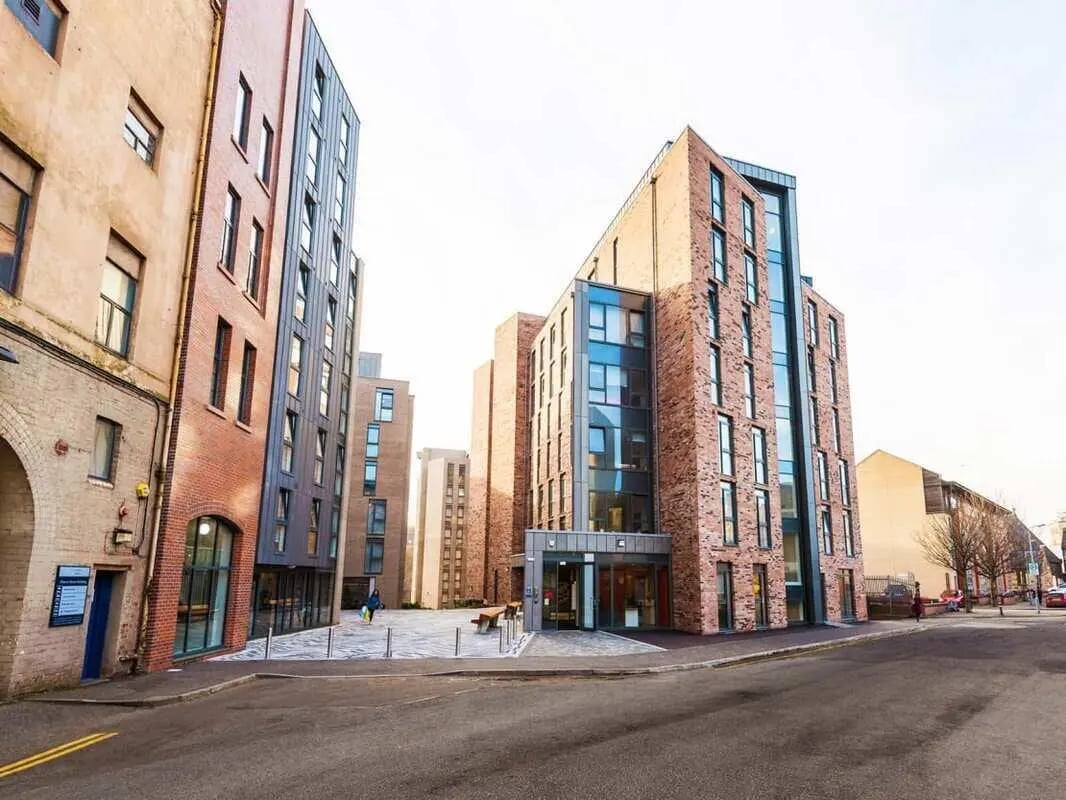 Modern brick buildings with glass facade exterior at Dunaskin Mill in Glasgow Student Accommodation