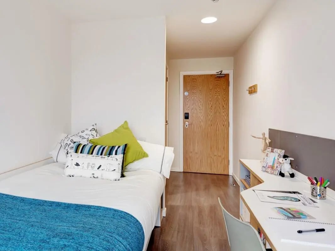 Bed desk and door student bedroom at Dunaskin Mill in Glasgow Student Accommodation