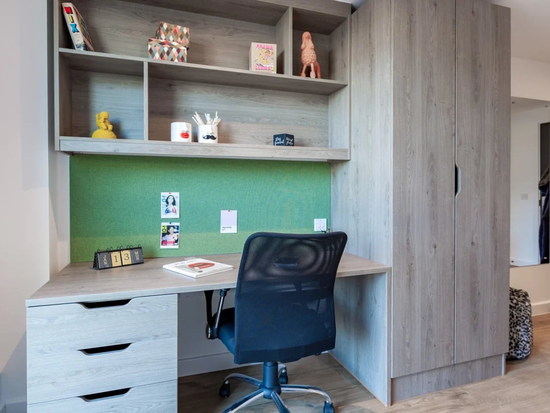 Desk chair calendar book and shelves Study area at Pavilion Point in Brighton Student Accommodation