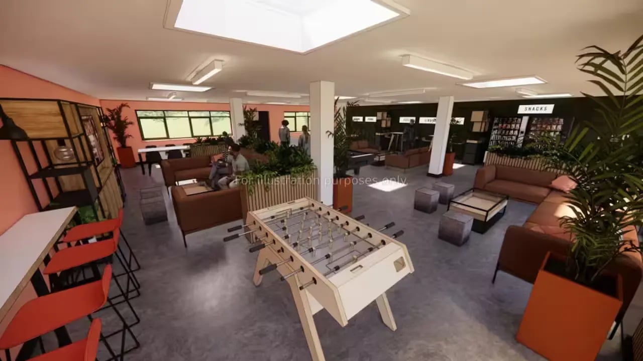Foosball table couches coffee tables vending area common room at Paddington Park House in Liverpool Student Accommodation
