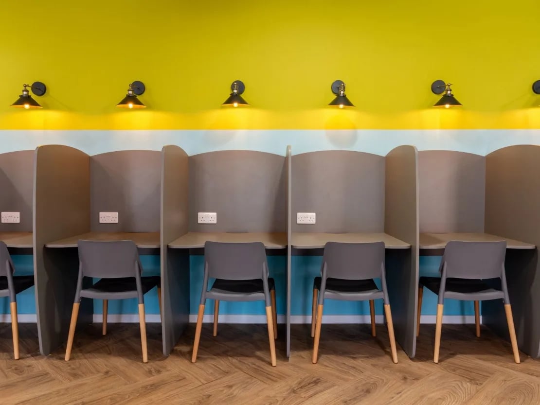 Study carrels with chairs and power outlets study area at Gulson Gardens in Coventry Student Accommodation