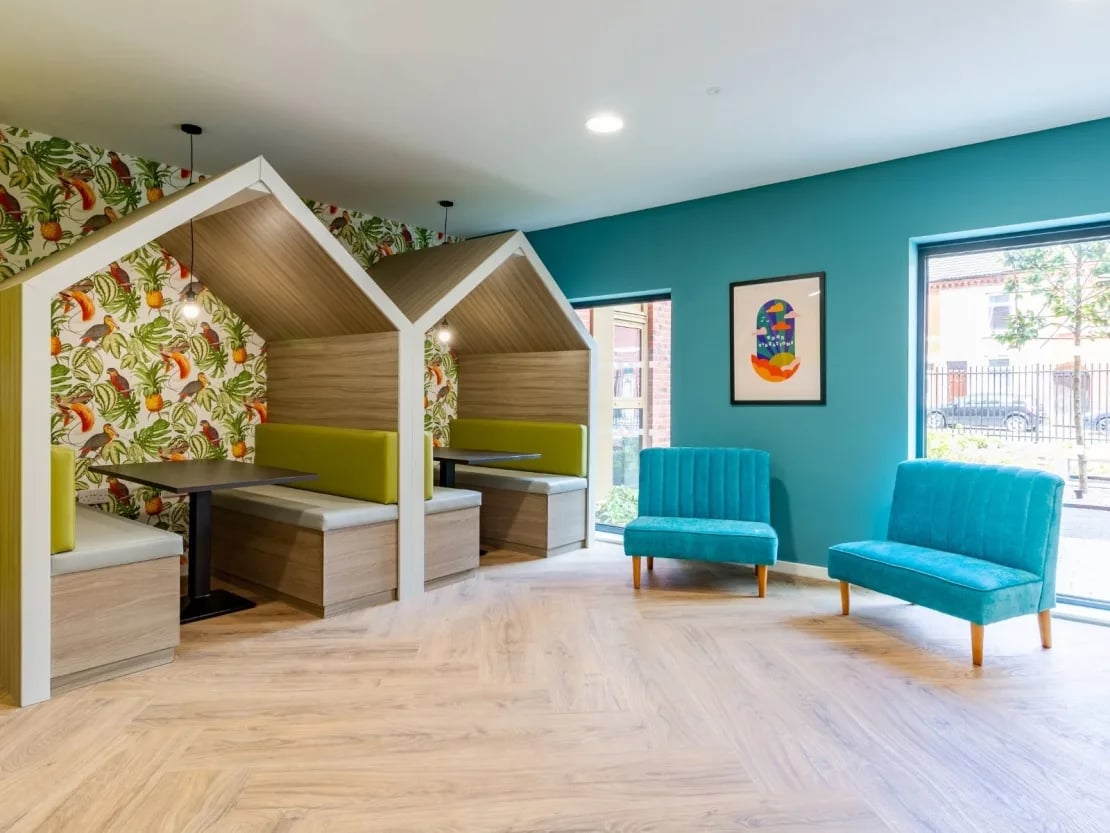 House-shaped booths and teal sofas common area at Gulson Gardens in Coventry Student Accommodation