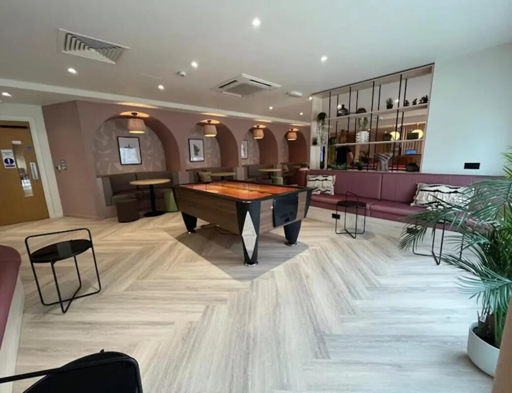 Pool table booths and lounge seating communal area at Byrom Point in Liverpool Student Accommodation