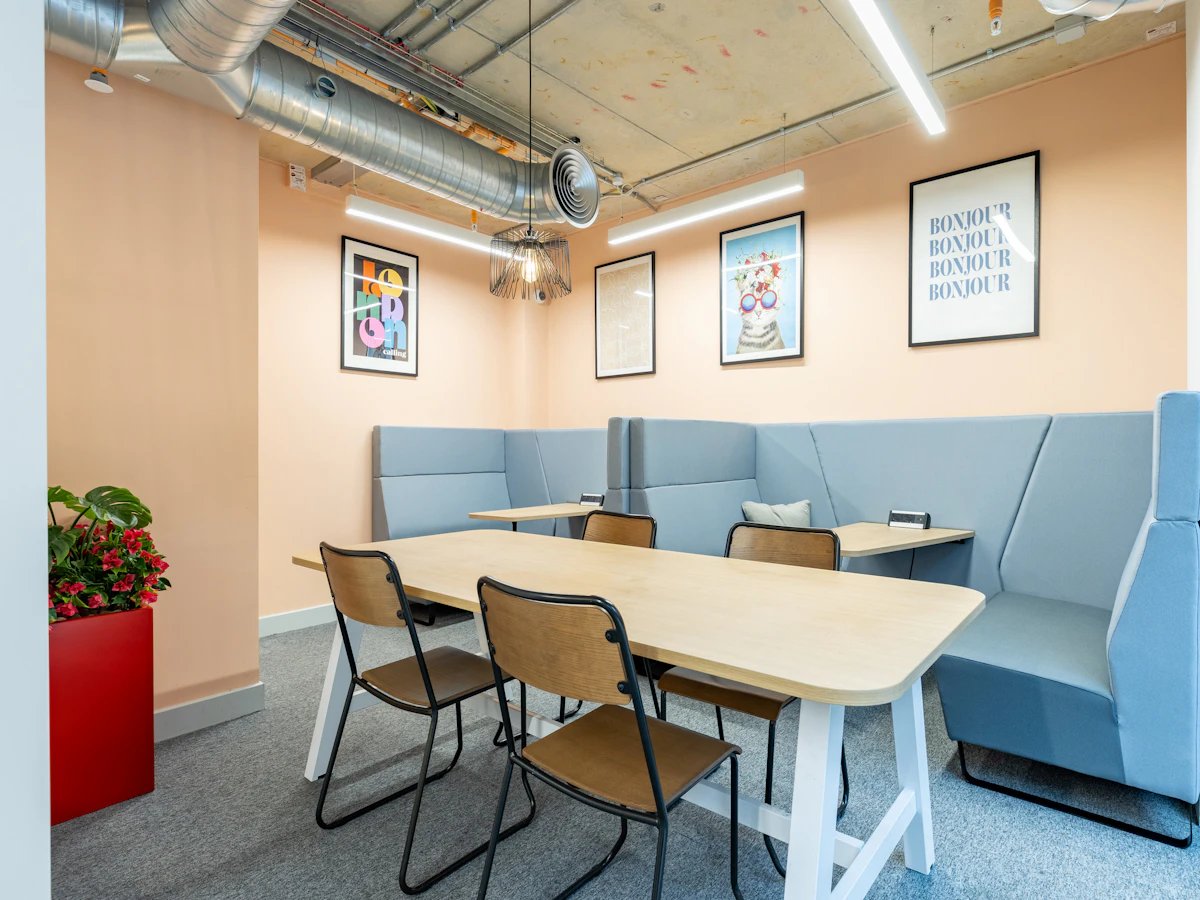 Study area with tables chairs and seating communal area at Venue Studios in London Student Accommodation