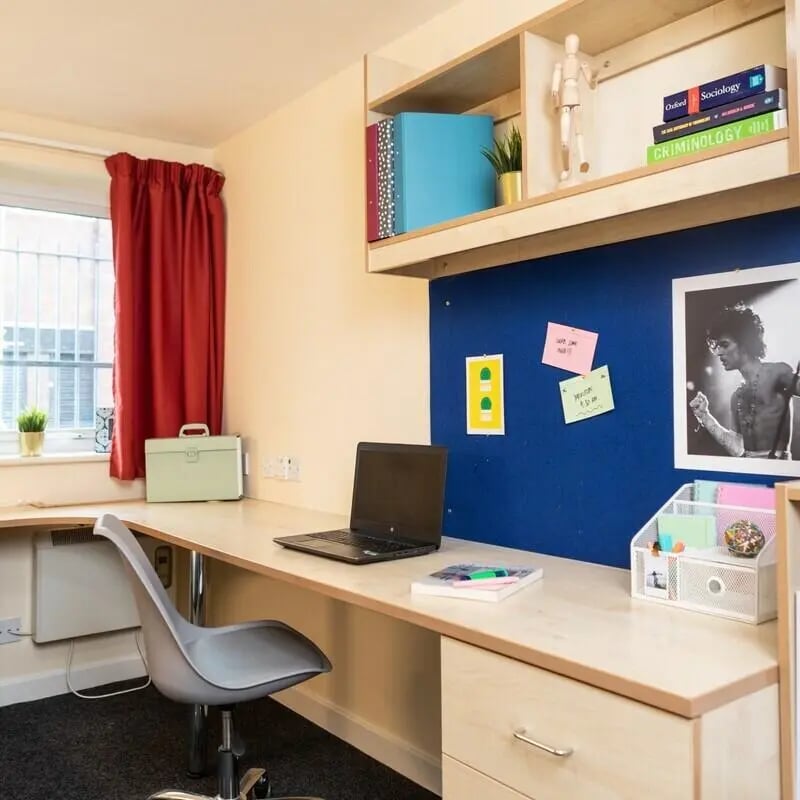 Desk with laptop and chair study area at Albert Court in Liverpool Student Accommodation
