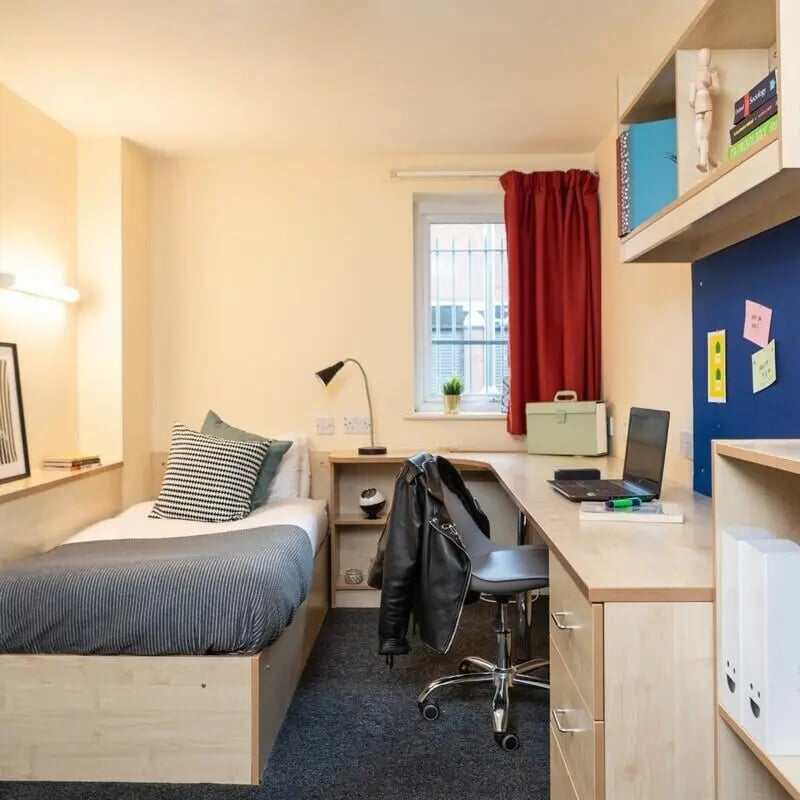 Bed desk chair and window bedroom at Albert Court in Liverpool Student Accommodation