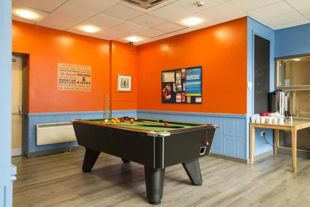 Pool table with colorful balls and cues communal area at Albert Court in Liverpool Student Accommodation