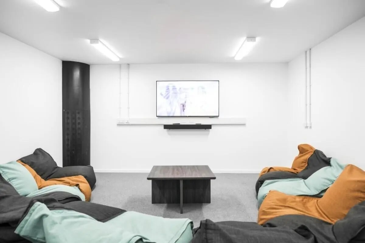 Beanbags television and coffee table living room at Prince Consort Village in London Student Accommodation