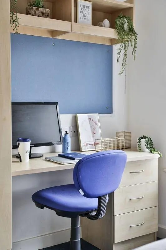 Desk with computer chair and drawers study area at Pavilion Court in Canterbury Student Accommodation