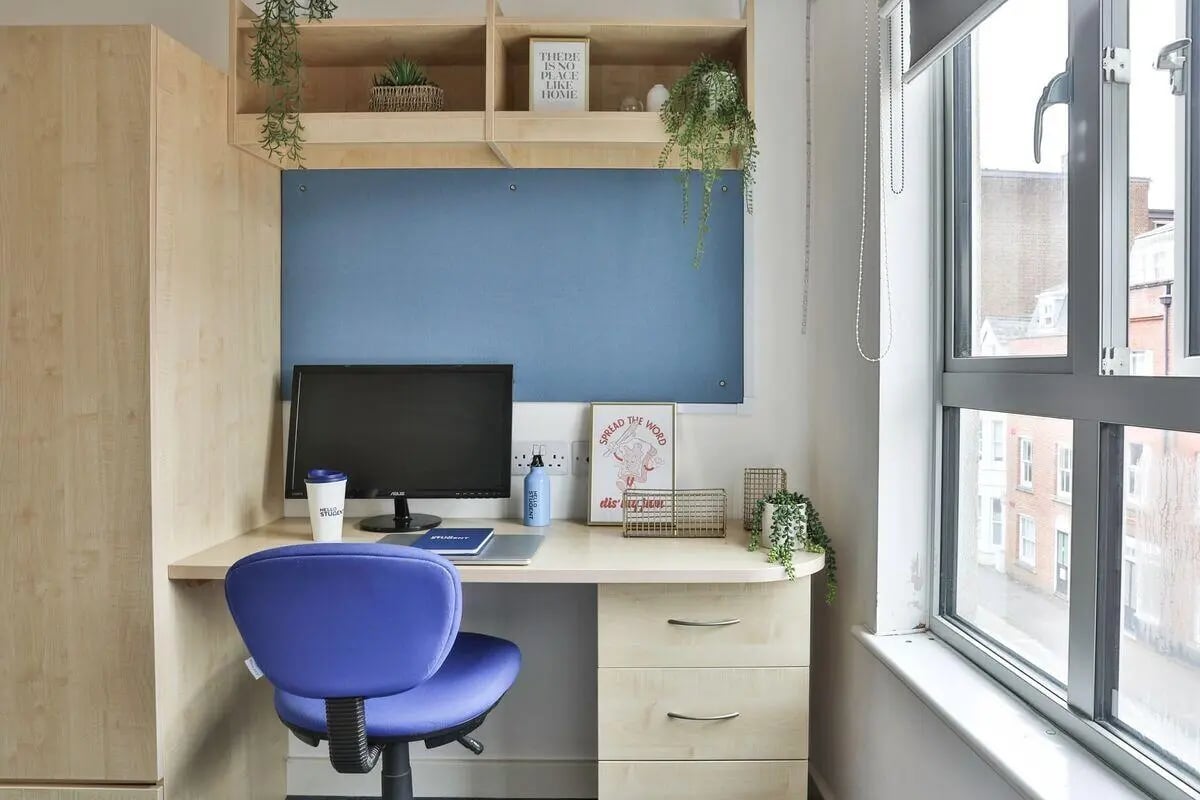 Desk computer chair and storage study area at Pavilion Court in Canterbury Student Accommodation