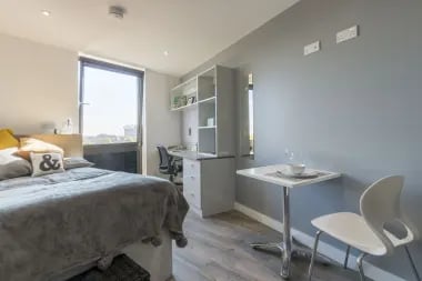Bed desk shelving table chair bedroom at Glendower House in Cardiff Student Accommodation