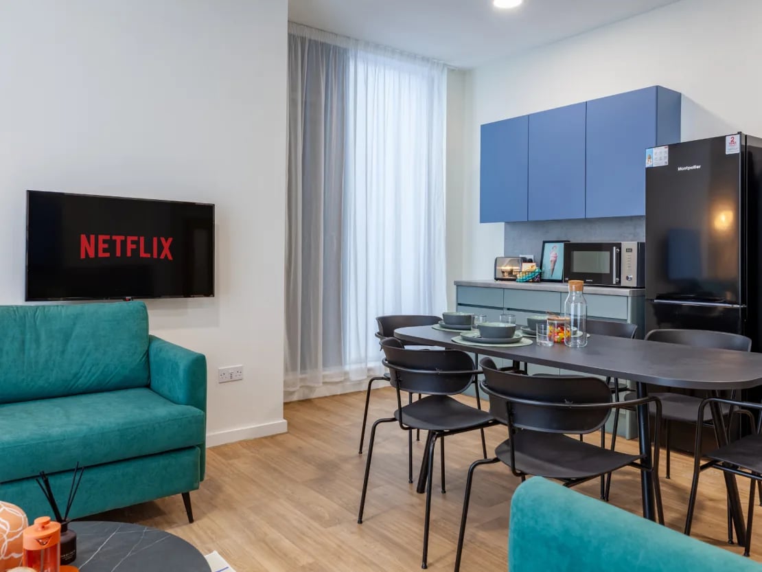 Sofa Netflix screen kitchen and dining area living room at The Waterways Nottingham in Nottingham Student Accommodation