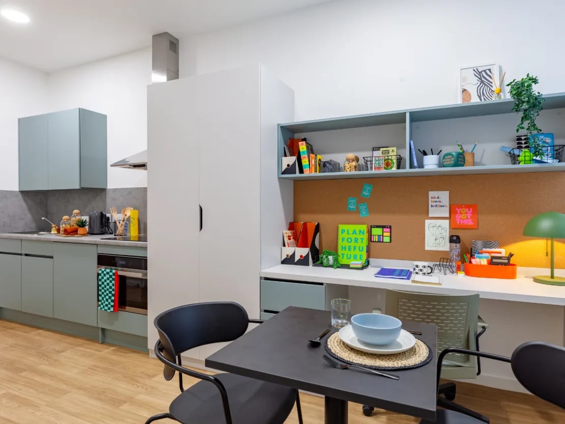 Kitchen study area with dining table living room at The Waterways Nottingham in Nottingham Student Accommodation