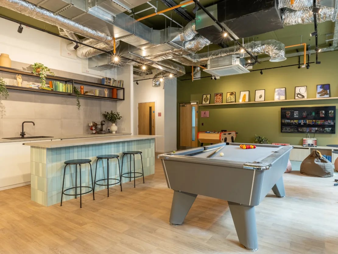 Pool table foosball kitchen area communal room at The Waterways Nottingham in Nottingham Student Accommodation