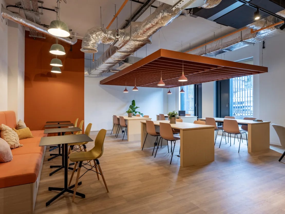 Orange sofa tables and chairs study area at The Waterways Nottingham in Nottingham Student Accommodation