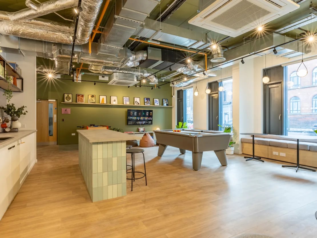 Pool table foosball table kitchen common area at The Waterways Nottingham in Nottingham Student Accommodation