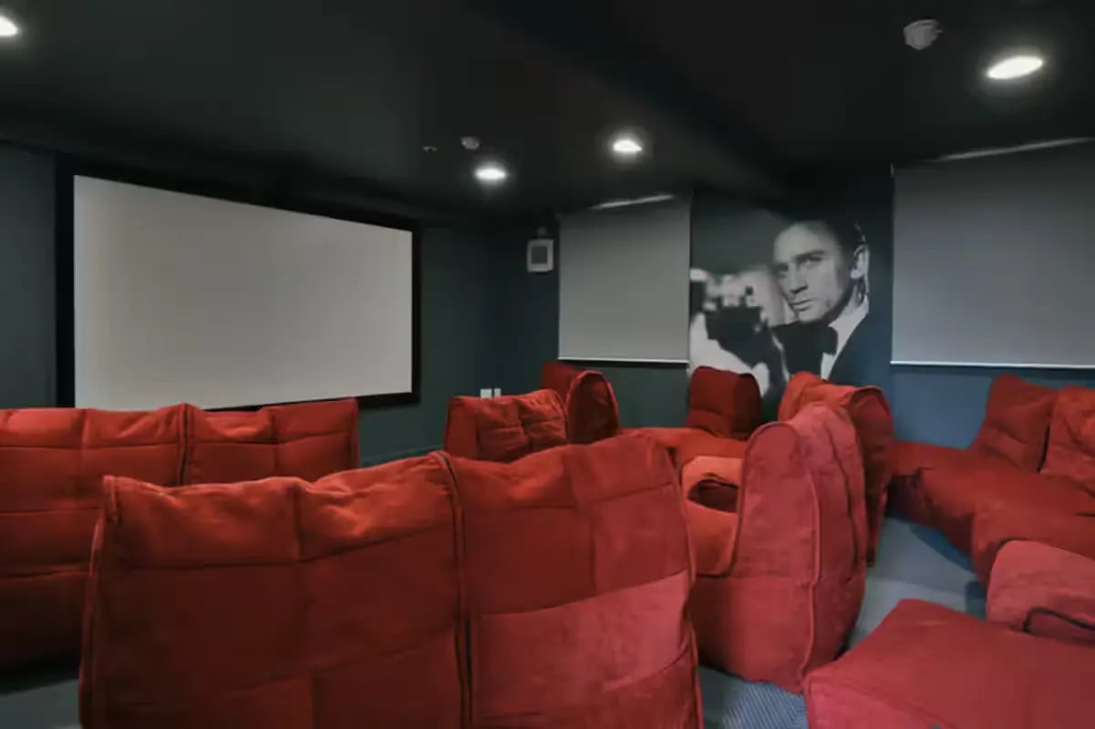 Movie room with red beanbags and screen Cinema room at Provincial House in Sheffield Student Accommodation