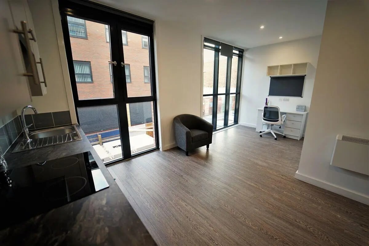 Sink desk chair and shelving student studio apartment at St Marks Court - Nottingham in Nottingham Student Accommodation