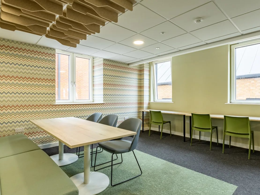 Wooden table benches chairs study area at Radford Mill in Nottingham Student Accommodation