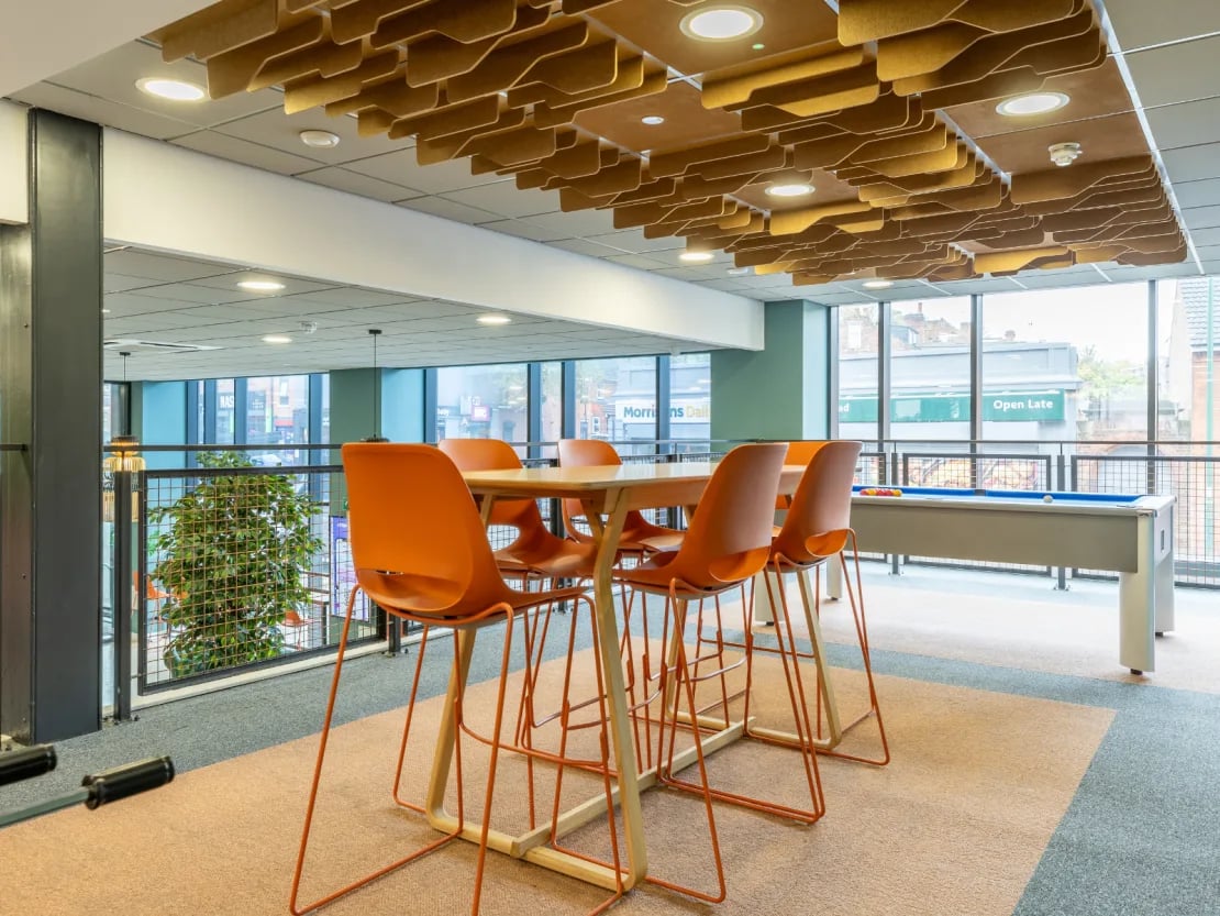 Orange chairs table and pool table communal area at Radford Mill in Nottingham Student Accommodation