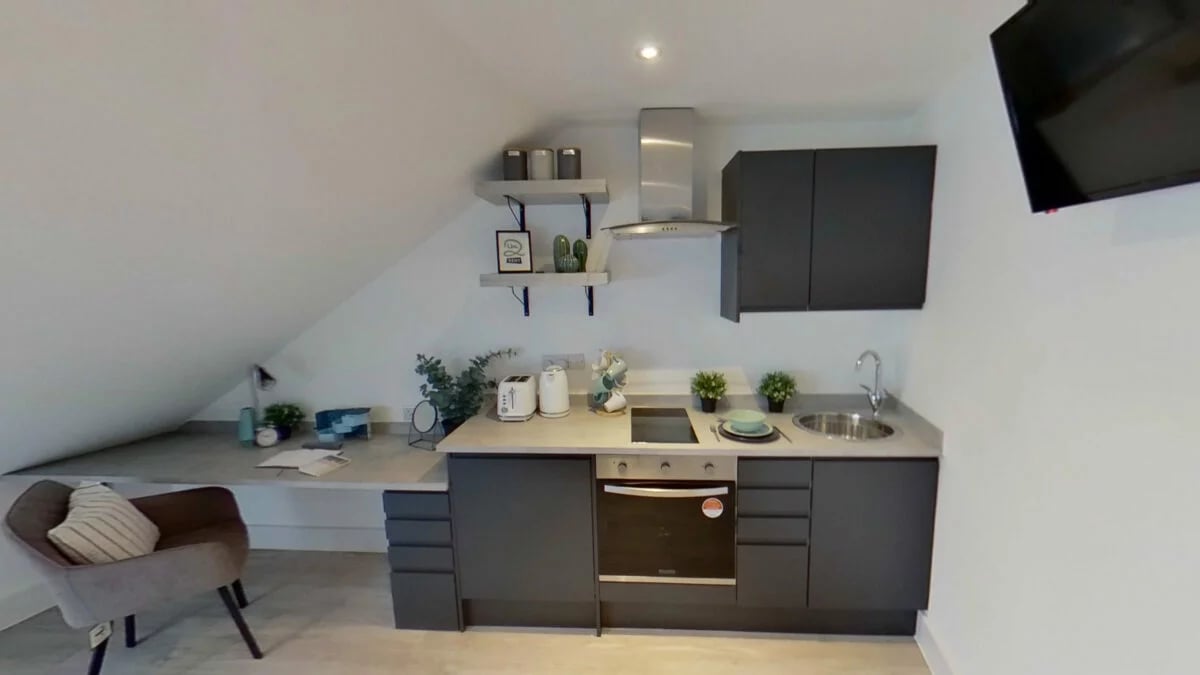Desk chair toaster kettle sink kitchen study area at Dojo House Nottingham in Nottingham Student Accommodation