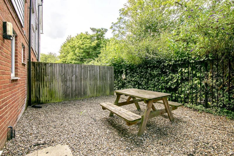 Picnic table on gravel patio exterior at Parham Student Village in Canterbury Student Accommodation
