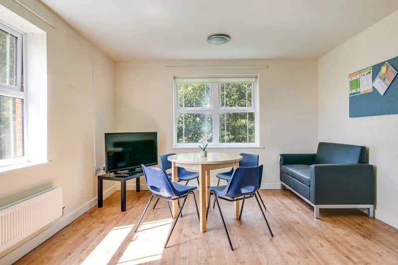 Sofa television table chairs living room at Parham Student Village in Canterbury Student Accommodation
