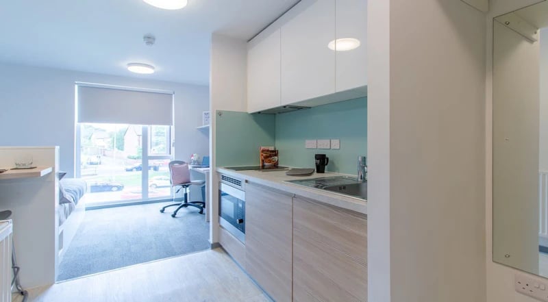 Modern student studio with kitchen and bed. at Duresme Court in Durham Student Accommodation