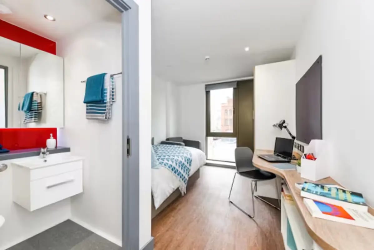Desk bed chair towels sink bathroom bedroom at Great Patrick Street in Belfast Student Accommodation