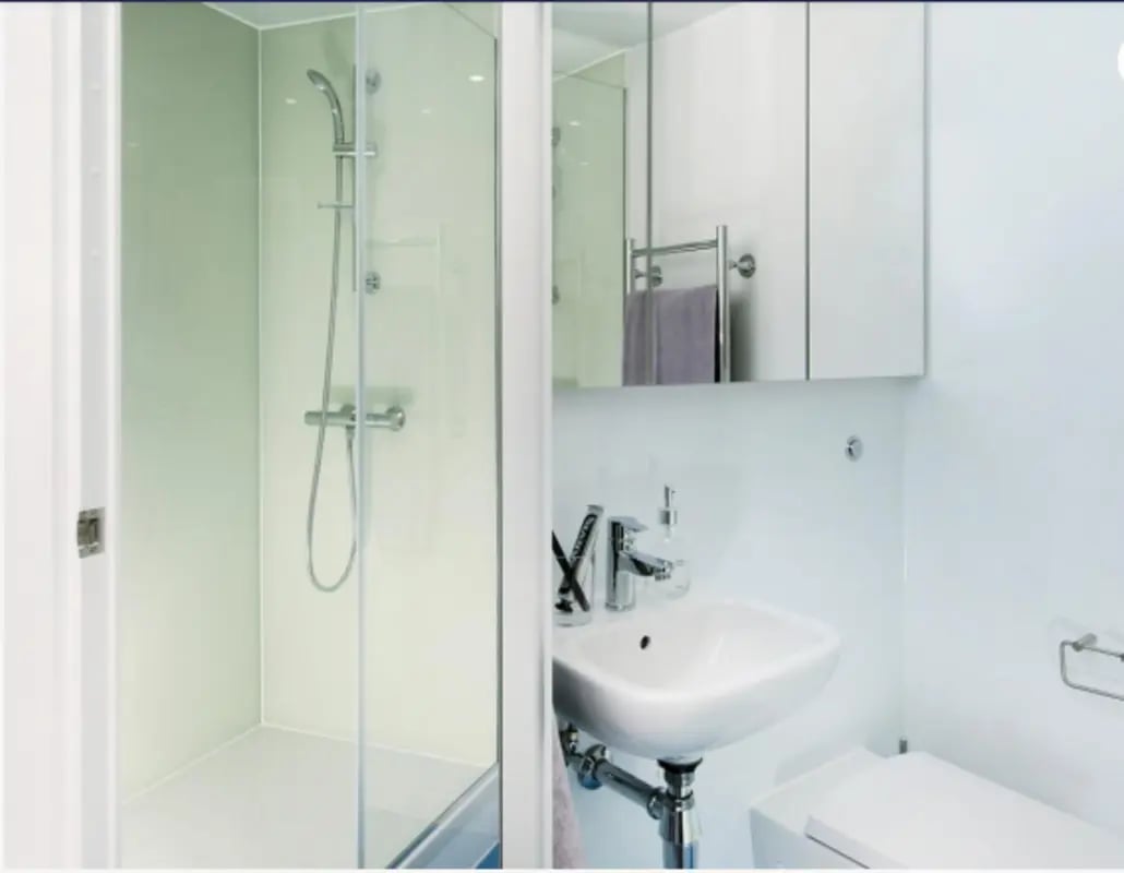 Shower sink toilet cabinet mirror bathroom at Scape Bloomsbury in London Student Accommodation