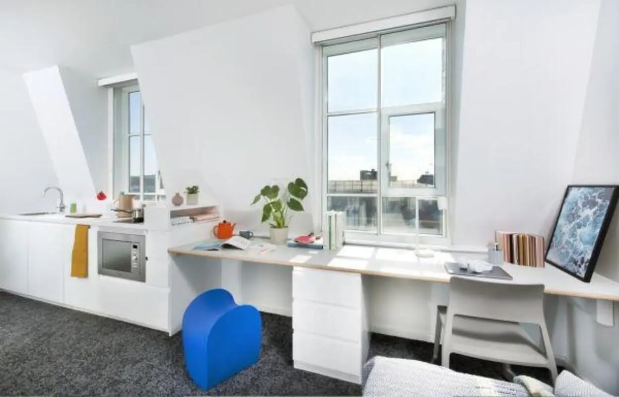 Kitchen microwave desk chair artwork study area at Scape Bloomsbury in London Student Accommodation