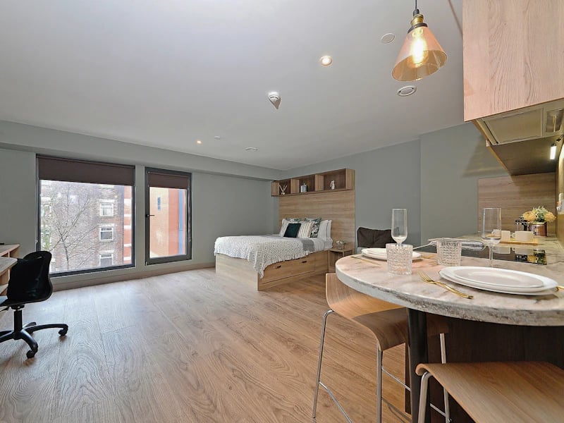 Bed desk and kitchen counter studio apartment at Fontenoy Apartments in Liverpool Student Accommodation