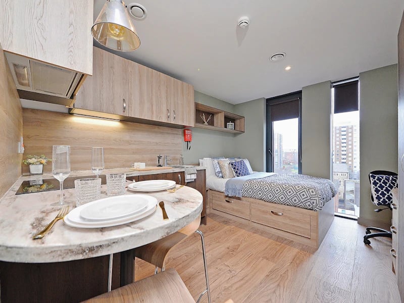 Bed kitchen dining table and bed living room at Fontenoy Apartments in Liverpool Student Accommodation