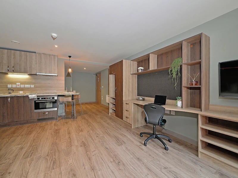 Kitchen study area with desk and laptop at Fontenoy Apartments in Liverpool Student Accommodation
