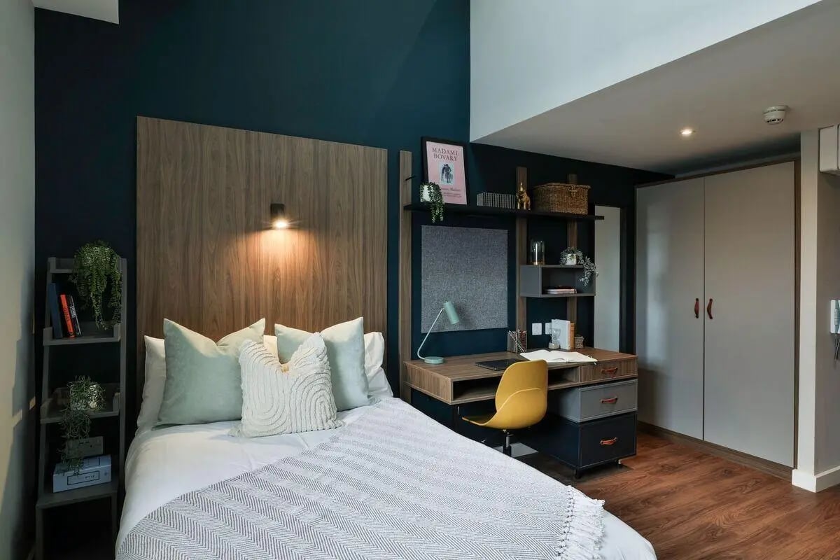 Bed desk plants and closet bedroom at St Mary's in Bristol Student Accommodation