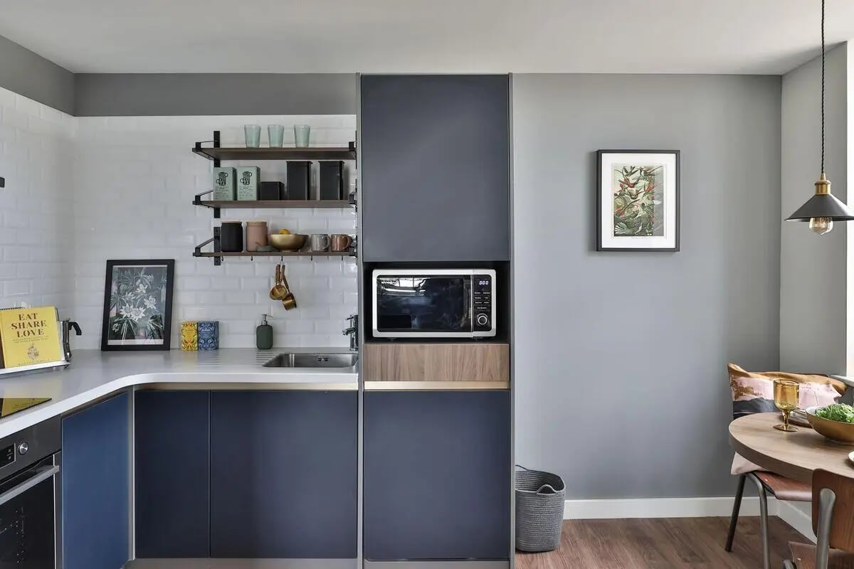 Counter with sink microwave and cabinets Kitchen at St Mary's in Bristol Student Accommodation