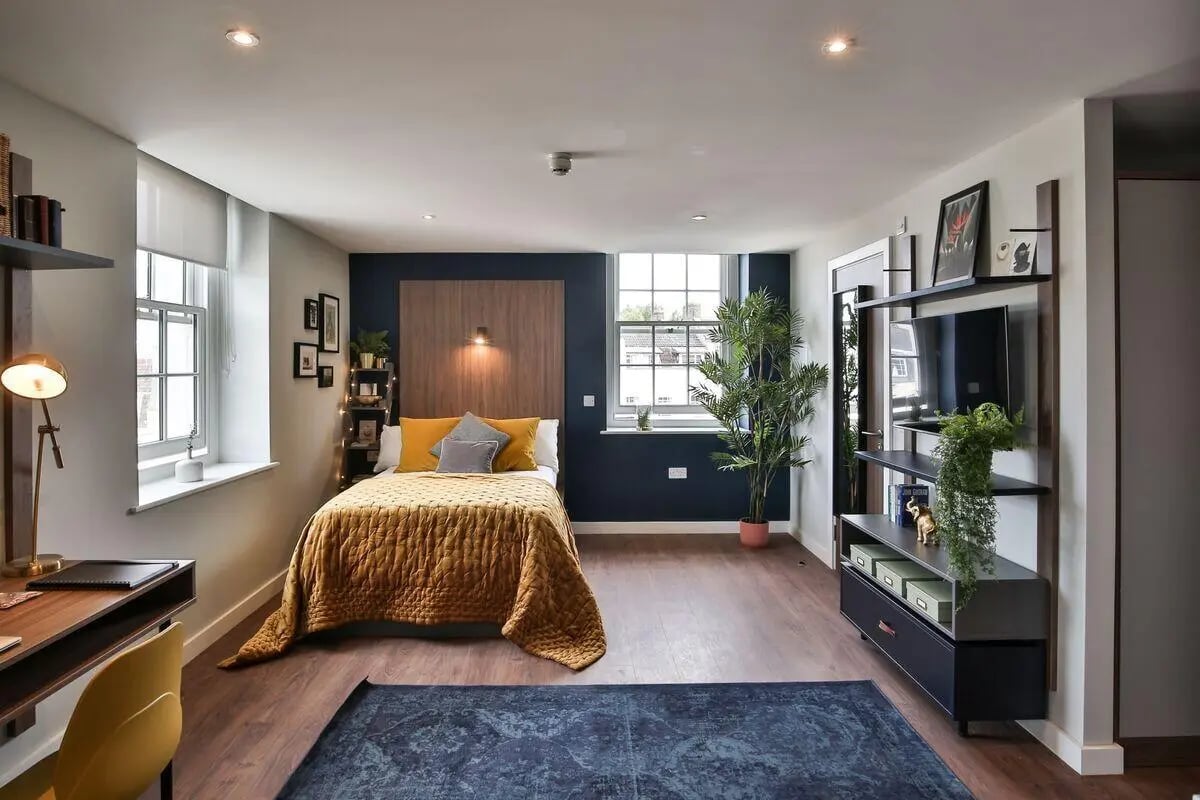 Bed desk shelving unit and TV bedroom at St Mary's in Bristol Student Accommodation