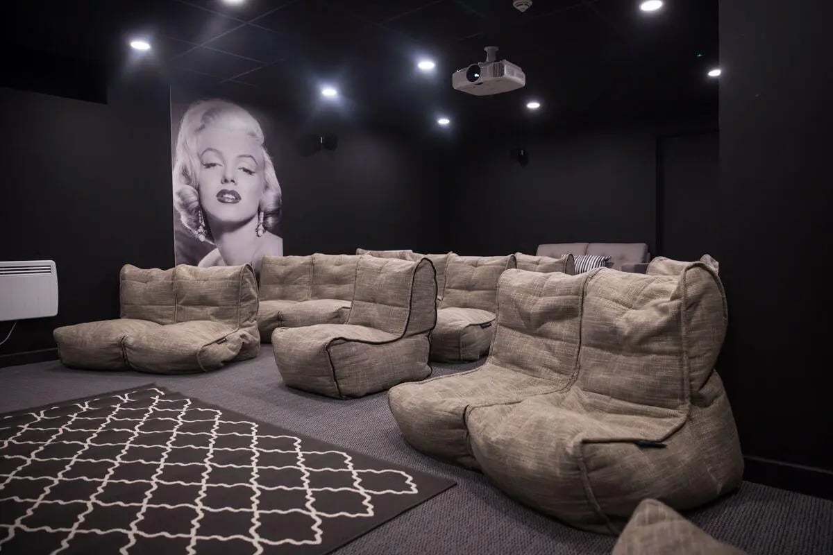 Beanbag chairs sofas Marilyn Monroe mural cinema at William & Matthew House in Bristol Student Accommodation