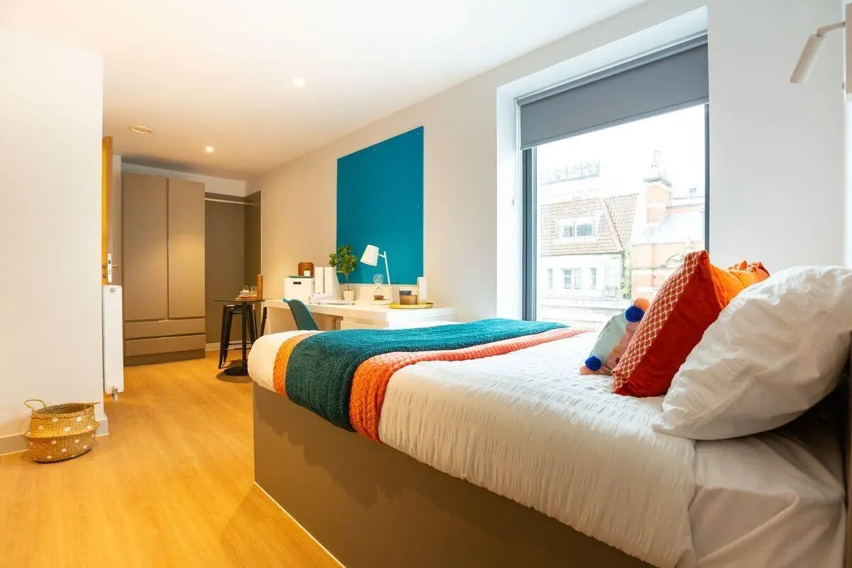 Bed desk and wardrobe student bedroom at Market Quarter Studios in Bristol Student Accommodation