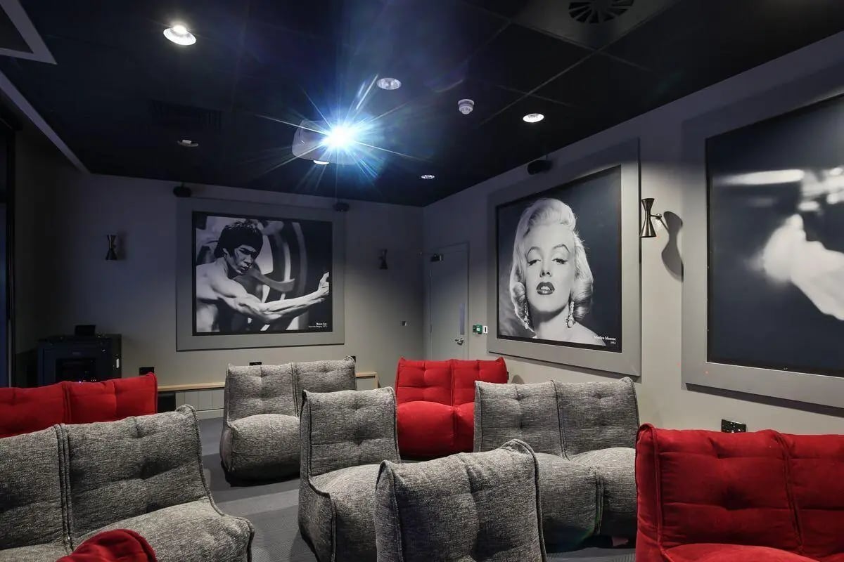Beanbag chairs projector movie posters cinema room at King's Stables Road in Edinburgh Student Accommodation