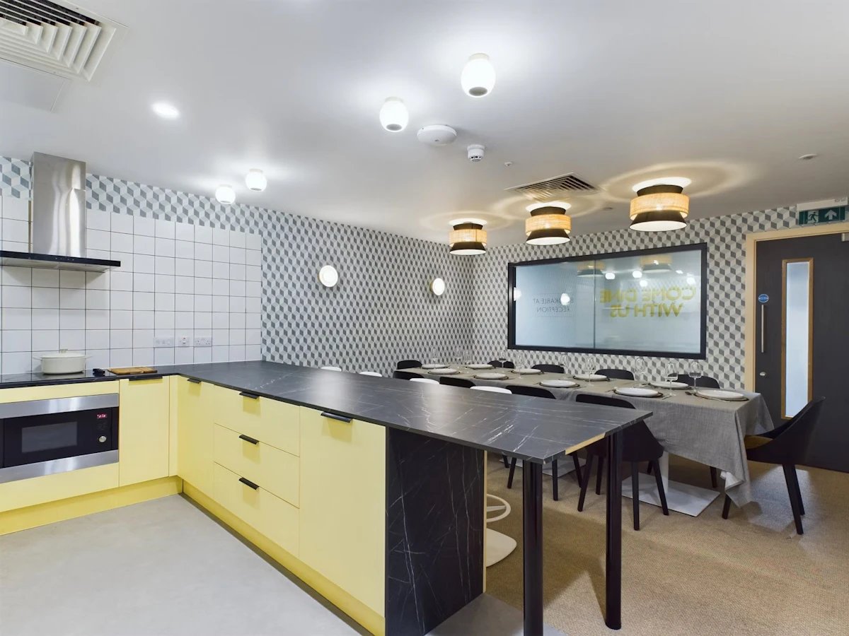 Kitchen island with dining table and chairs kitchen at Crown Place - Nottingham in Nottingham Student Accommodation