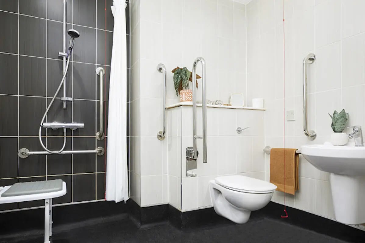 Shower toilet sink with grab bars bathroom at Staniforth House in Birmingham Student Accommodation