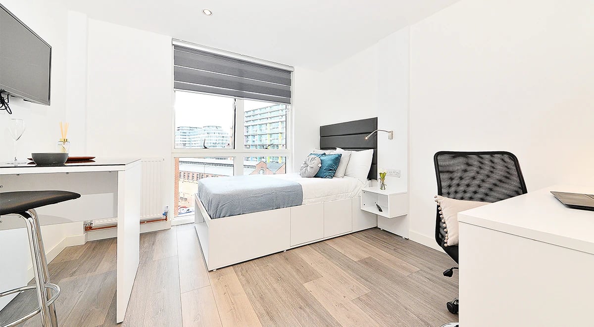 Bed desk TV and window bedroom at Miura in Nottingham Student Accommodation