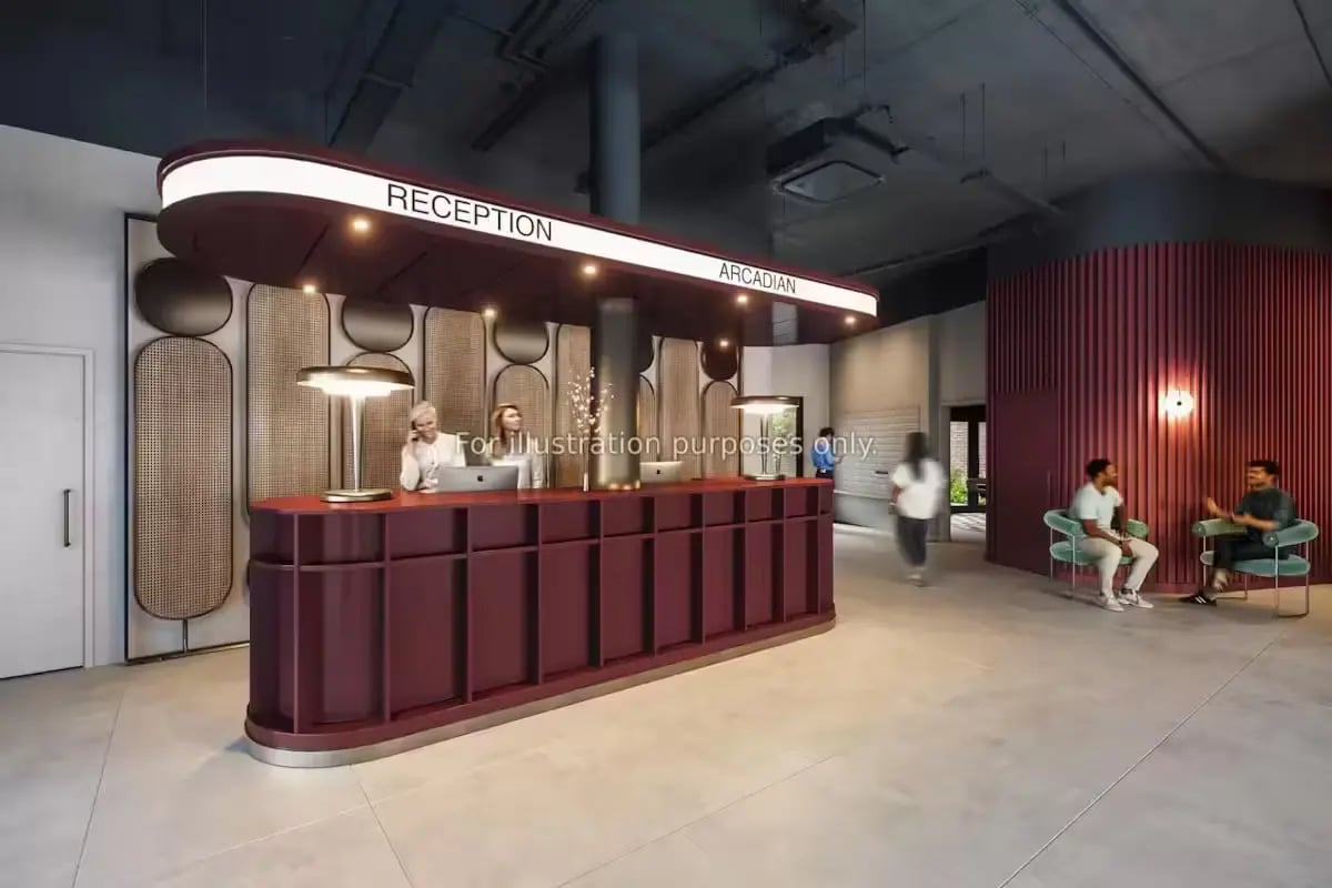 Reception desk with staff and seating area interior at Arcadian in Nottingham Student Accommodation
