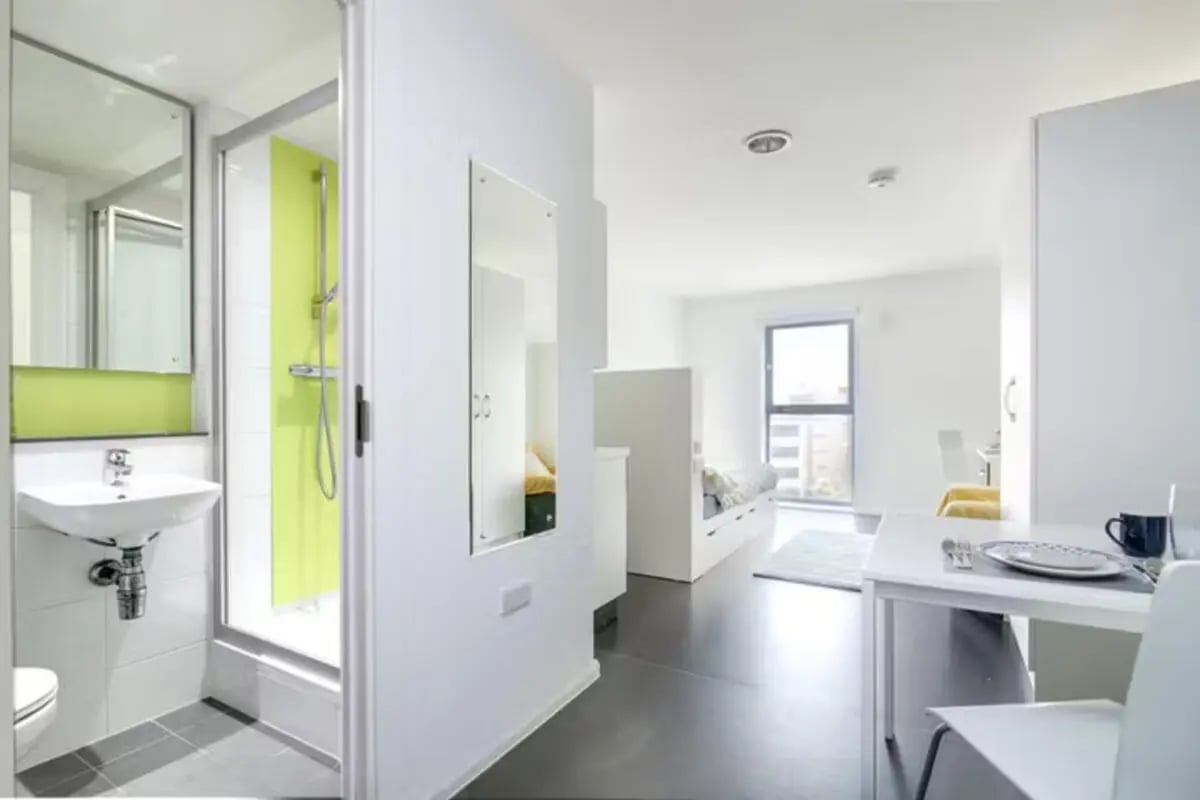 Modern student room with shower sink and bed at Lucas Studios in Birmingham Student Accommodation
