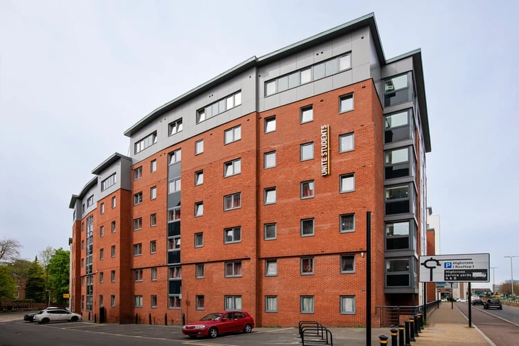 Red brick student accommodation building signage exterior at Castle Court in Leicester Student Accommodation