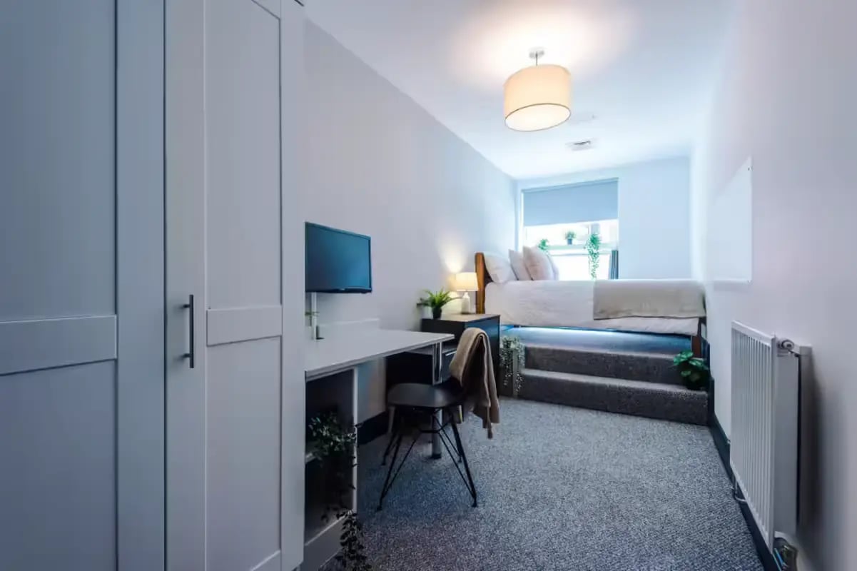 Wardrobe desk bed and radiator bedroom at The Shoe & Boot Factory in Leicester Student Accommodation