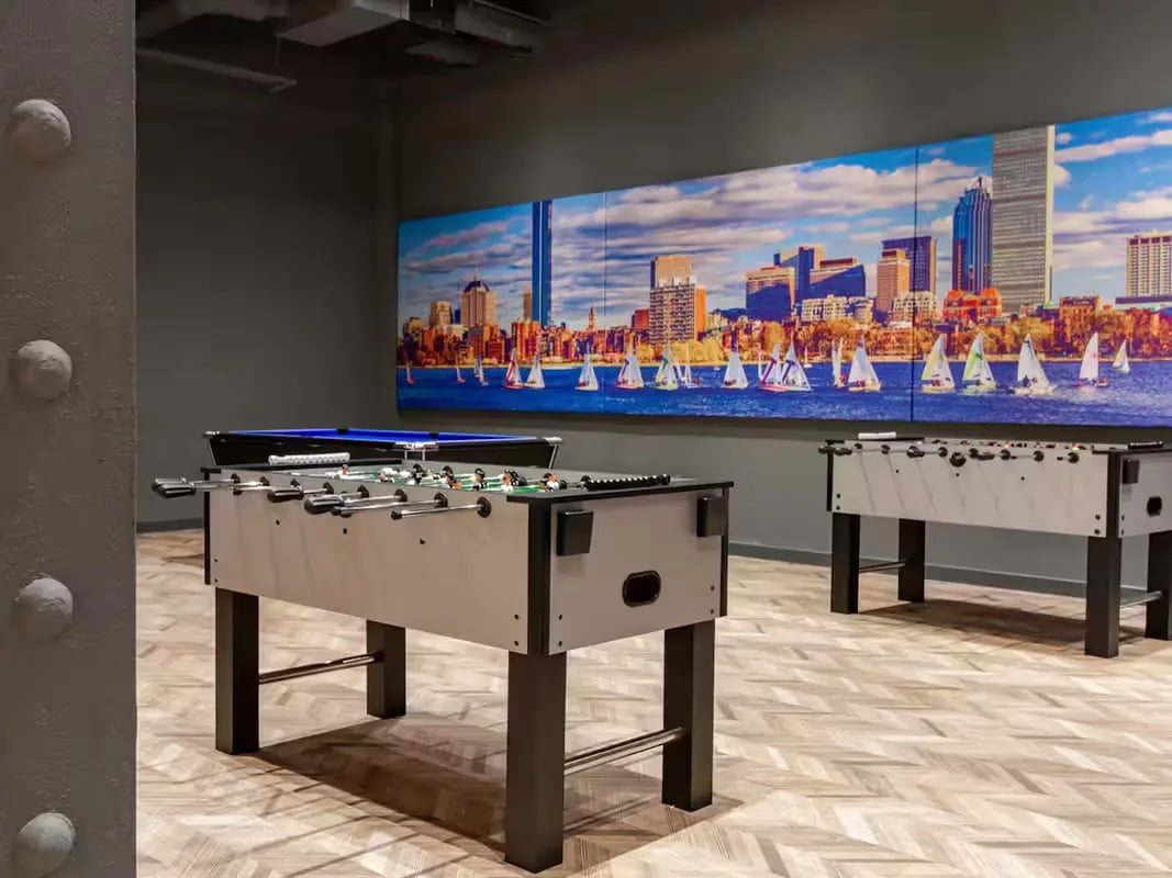 Two foosball tables and pool table playing area at Plymouth Cross House in Plymouth Student Accommodation