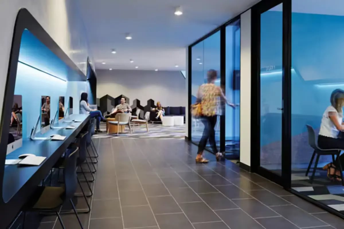 Modern study area with computers and lounge seating Study area at Scape Berkeley in Melbourne Student Accommodation