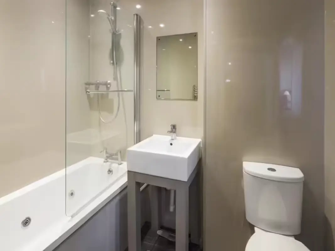 Bathtub sink toilet mirror modern bathroom at 125 Leek Road in Stoke-On-Trent Student Accommodation